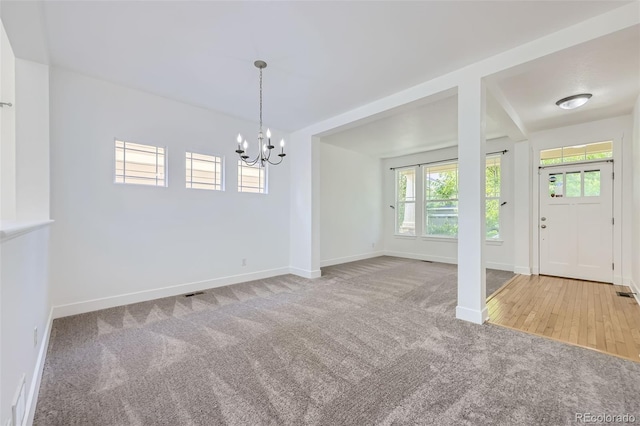 3514 E 141st Dr, Thornton, CO 80602 - unfurnished room with carpet flooring and a chandelier