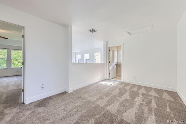 3514 E 141st Dr, Thornton, CO 80602 - carpeted empty room featuring baseboards and attic access