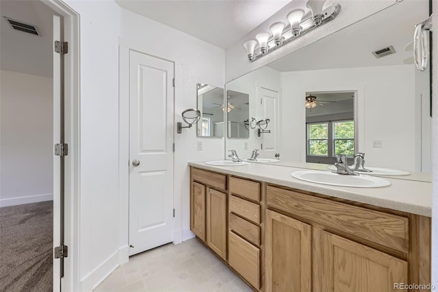 3514 E 141st Dr, Thornton, CO 80602 - bathroom with ceiling fan and double vanity