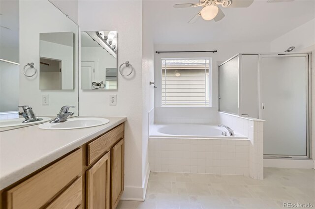 3514 E 141st Dr, Thornton, CO 80602 - full bathroom featuring a stall shower, a garden tub, vanity, ceiling fan, and tile patterned flooring