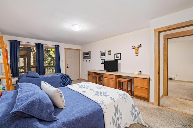 805 Columbine Rd Unit 202, Breckenridge, CO 80424 - bedroom featuring light carpet, access to outside, a desk, a baseboard heating unit, and baseboards