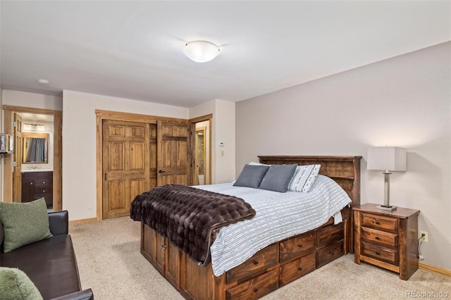 805 Columbine Rd Unit 202, Breckenridge, CO 80424 - bedroom with light carpet, a closet, and baseboards