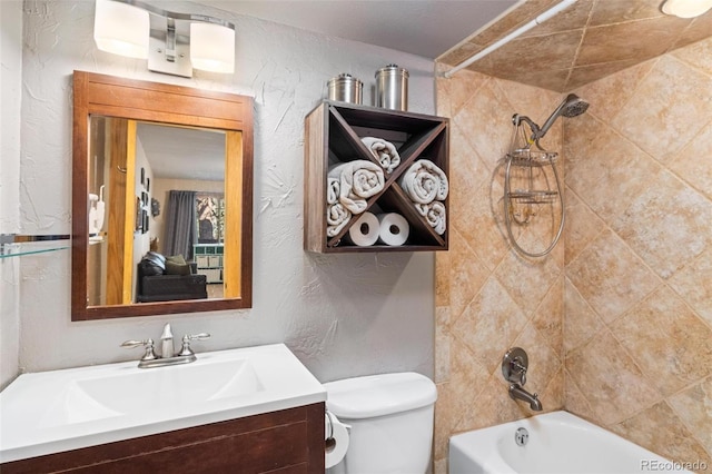 805 Columbine Rd Unit 202, Breckenridge, CO 80424 - bathroom with vanity, shower / bathtub combination, a textured wall, and toilet