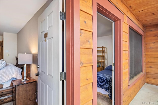 805 Columbine Rd Unit 202, Breckenridge, CO 80424 - carpeted bedroom with wood walls