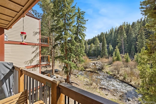 805 Columbine Rd Unit 202, Breckenridge, CO 80424 - wooden terrace featuring a view of trees