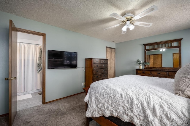 bedroom featuring a ceiling fan, baseboards, visible vents, carpet floors, and a textured ceiling