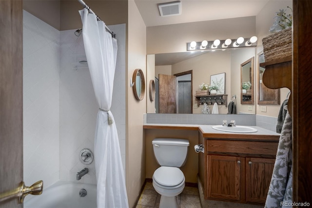 full bathroom featuring vanity, visible vents, shower / bath combo, tile patterned floors, and toilet