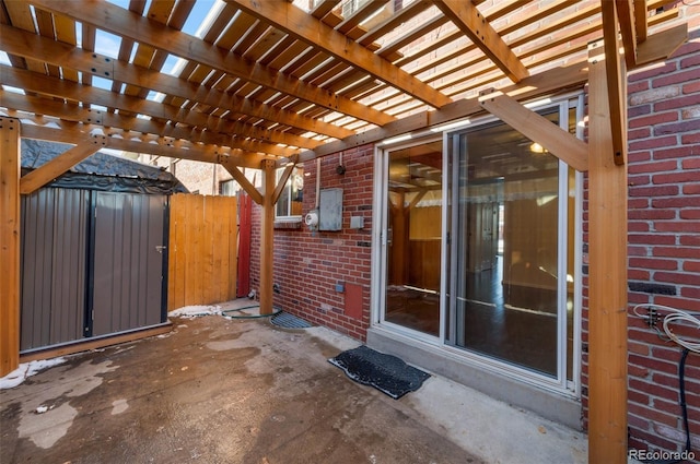 view of patio featuring a pergola