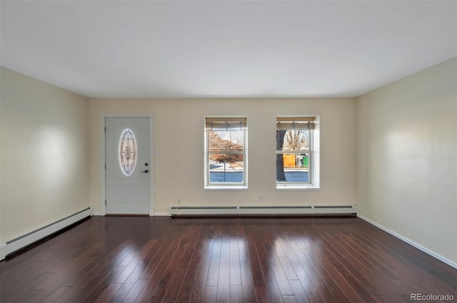 foyer entrance featuring dark hardwood / wood-style flooring and a baseboard radiator