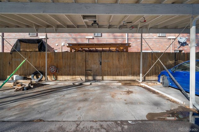 view of patio / terrace with a carport