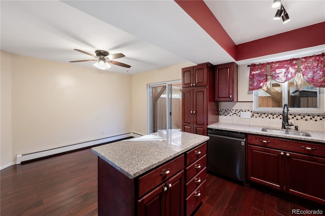 kitchen with tasteful backsplash, dishwasher, sink, dark hardwood / wood-style flooring, and a baseboard heating unit