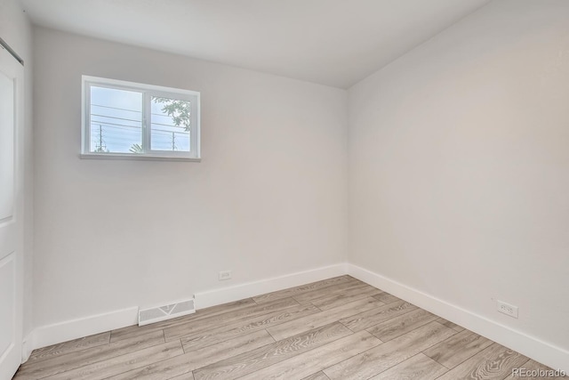 4435-4455 Elizabeth, Denver, CO 80206 - empty room featuring light wood-type flooring and baseboards