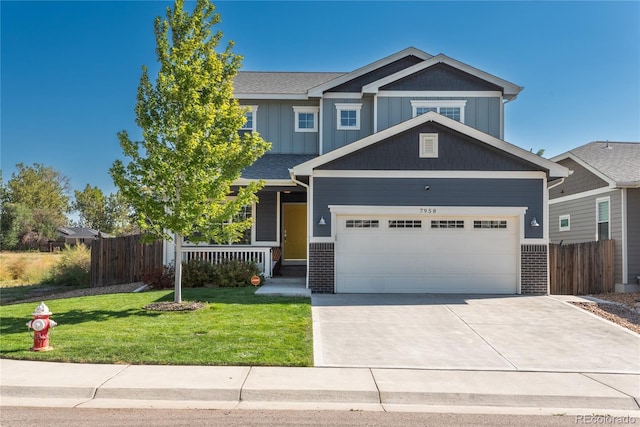 craftsman house featuring a porch, board and batten siding, a front lawn, and fence