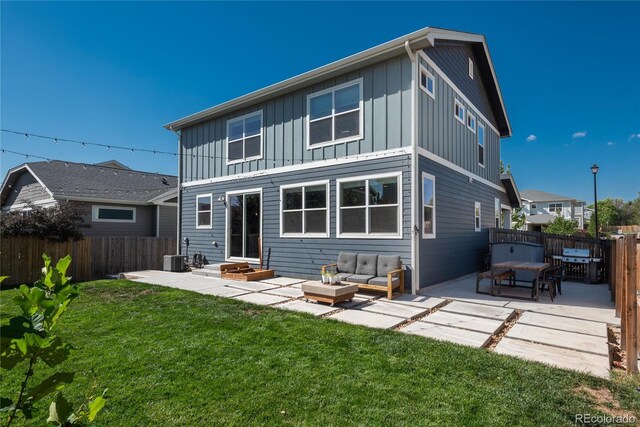 7958 Tejon St, Denver, CO 80221 - rear view of property featuring a patio area, an outdoor hangout area, and board and batten siding