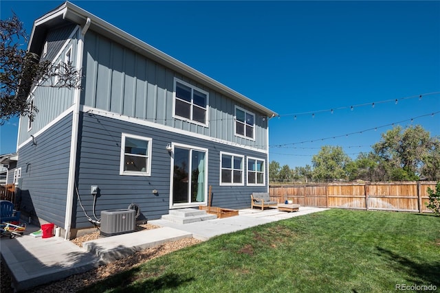 7958 Tejon St, Denver, CO 80221 - rear view of house with board and batten siding and cooling unit
