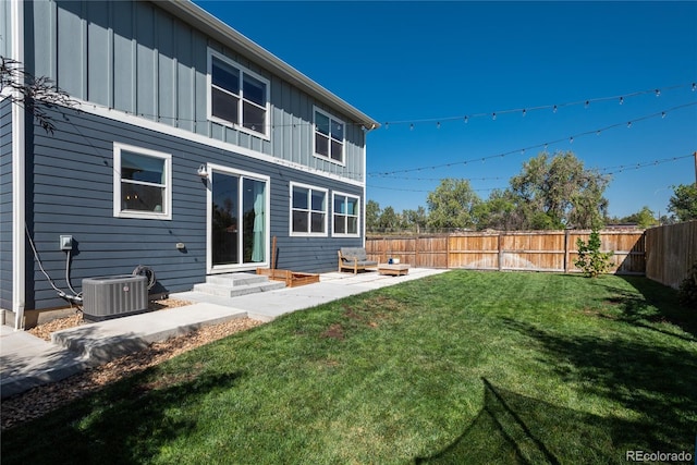 7958 Tejon St, Denver, CO 80221 - rear view of property featuring board and batten siding and central AC unit