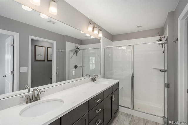 7958 Tejon St, Denver, CO 80221 - bathroom featuring a stall shower and double vanity