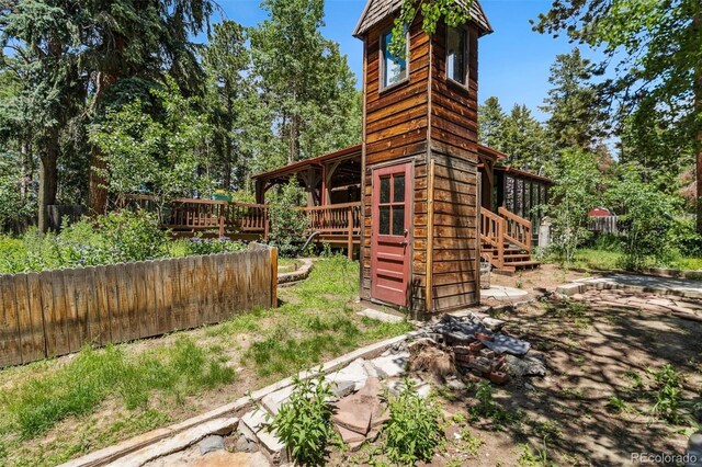 10990 Oehlman Ave, Conifer, CO 80433 - view of home's exterior featuring a wooden deck