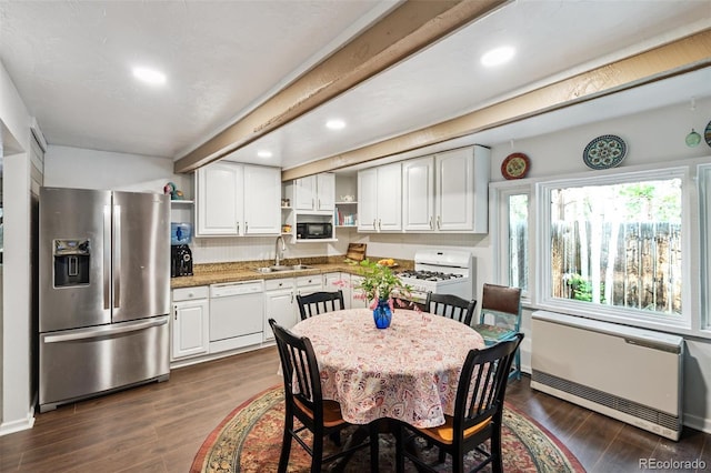 10990 Oehlman Ave, Conifer, CO 80433 - kitchen with white appliances, open shelves, dark wood-type flooring, white cabinetry, and recessed lighting