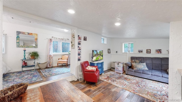 10990 Oehlman Ave, Conifer, CO 80433 - living area with hardwood / wood-style floors and recessed lighting
