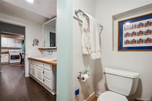 10990 Oehlman Ave, Conifer, CO 80433 - bathroom with vanity and wood finished floors