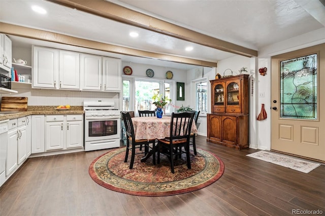 10990 Oehlman Ave, Conifer, CO 80433 - dining room with beam ceiling, dark wood-style flooring, and recessed lighting