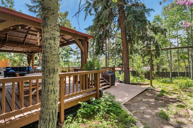 10990 Oehlman Ave, Conifer, CO 80433 - wooden deck with a gazebo and a fenced backyard