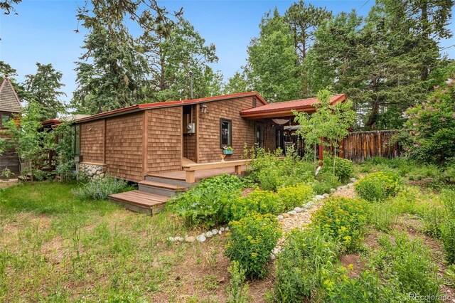 10990 Oehlman Ave, Conifer, CO 80433 - rear view of property featuring a wooden deck