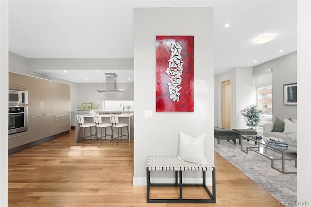 interior space featuring light wood-style floors and recessed lighting