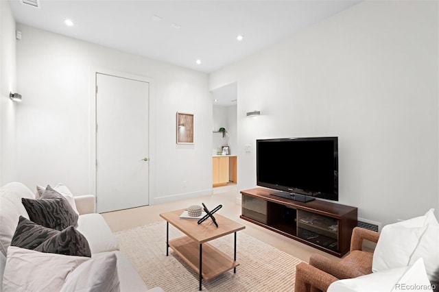 living area featuring baseboards, carpet, visible vents, and recessed lighting