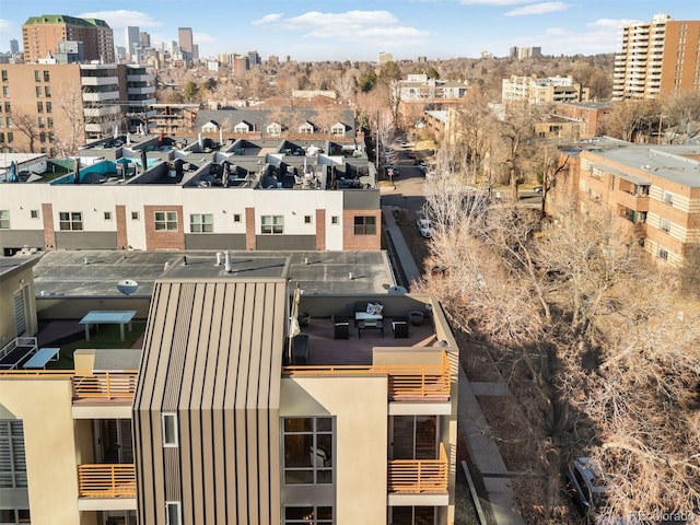 drone / aerial view featuring a city view