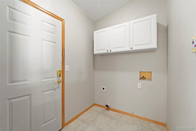 washroom featuring washer hookup, cabinet space, baseboards, and electric dryer hookup