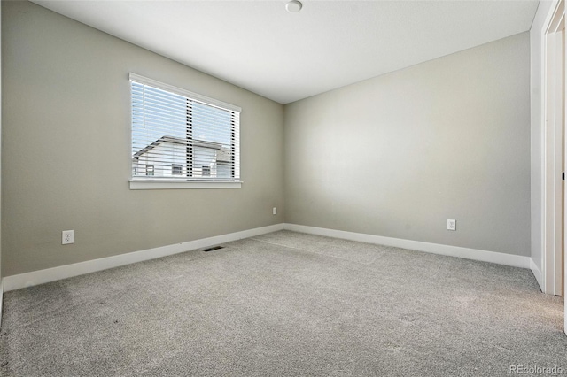 2074 S Holly St Unit 2, Denver, CO 80222 - carpeted spare room with baseboards