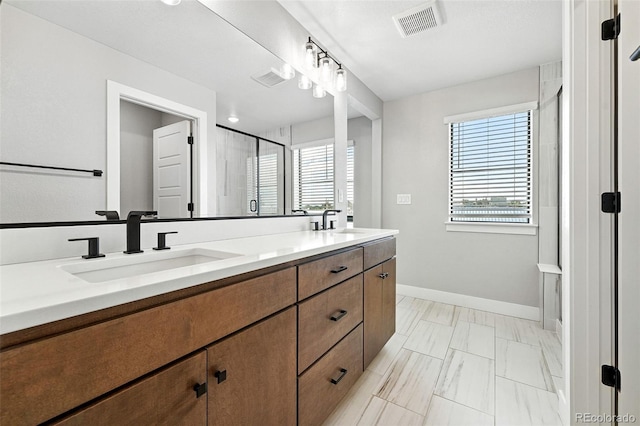 2074 S Holly St Unit 2, Denver, CO 80222 - full bath featuring double vanity, marble look tiles, and a stall shower