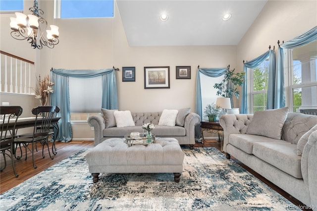 9631 S Dover Way, Littleton, CO 80127 - living room with a chandelier, wood finished floors, recessed lighting, and a high ceiling