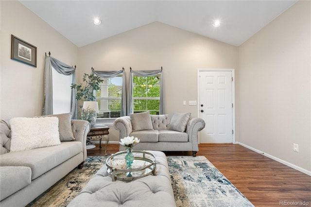 9631 S Dover Way, Littleton, CO 80127 - living room with lofted ceiling, wood finished floors, baseboards, and recessed lighting