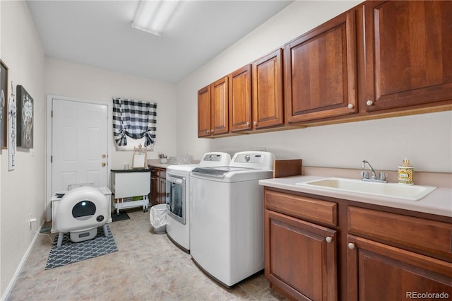 9631 S Dover Way, Littleton, CO 80127 - washroom featuring separate washer and dryer, cabinet space, and baseboards
