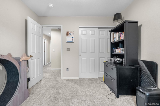 9631 S Dover Way, Littleton, CO 80127 - home office featuring light carpet and baseboards