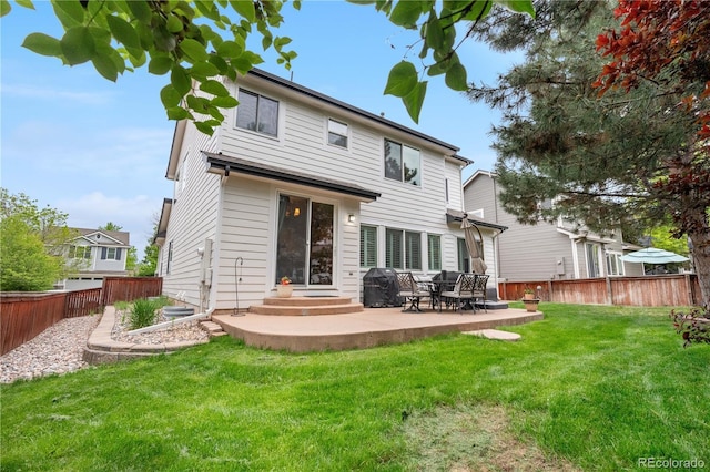 9631 S Dover Way, Littleton, CO 80127 - back of property with a patio area