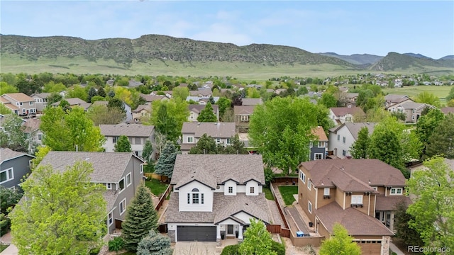 9631 S Dover Way, Littleton, CO 80127 - aerial view of residential area with a mountain backdrop