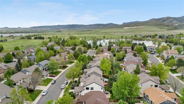 9631 S Dover Way, Littleton, CO 80127 - aerial view of residential area featuring a water and mountain view