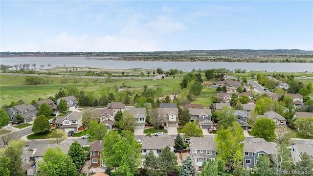 9631 S Dover Way, Littleton, CO 80127 - aerial perspective of suburban area with a nearby body of water