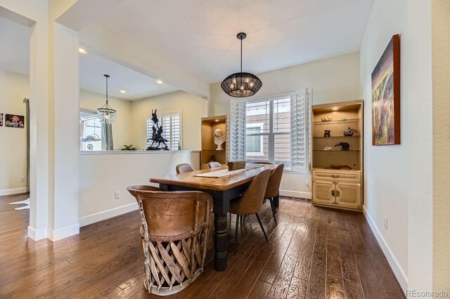 14969 Elsinore Ave, Parker, CO 80134 - dining area with a chandelier, dark wood-type flooring, plenty of natural light, and recessed lighting