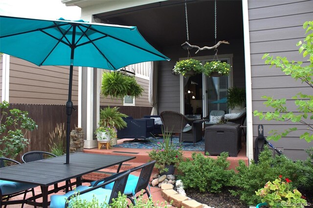 14969 Elsinore Ave, Parker, CO 80134 - view of patio with outdoor dining space and an outdoor living space