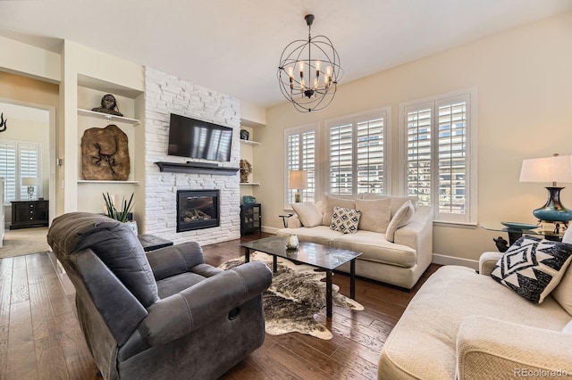14969 Elsinore Ave, Parker, CO 80134 - living room with healthy amount of natural light, baseboards, and hardwood / wood-style flooring