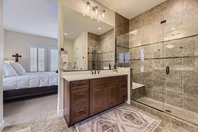 14969 Elsinore Ave, Parker, CO 80134 - bathroom with vanity, a stall shower, and connected bathroom