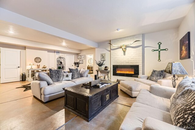 14969 Elsinore Ave, Parker, CO 80134 - living room with a fireplace, concrete floors, and recessed lighting