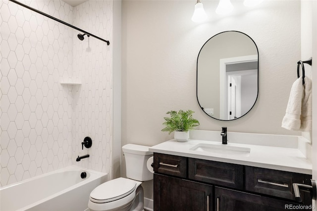 full bathroom featuring vanity, toilet, and tiled shower / bath