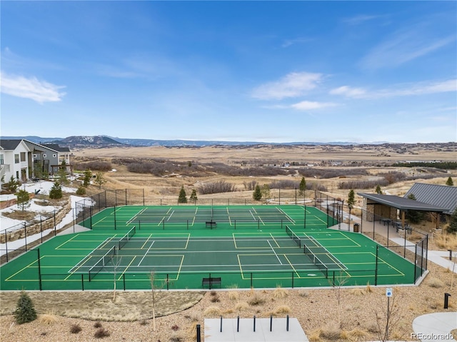 view of sport court with a mountain view