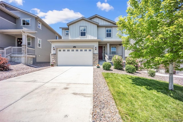 3325 Umber Cir, Castle Rock, CO 80109 - craftsman-style house featuring a porch, board and batten siding, concrete driveway, an attached garage, and stone siding